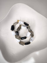 Elastisches Armband mit großen Natursteinen- Schwarz/ Grau